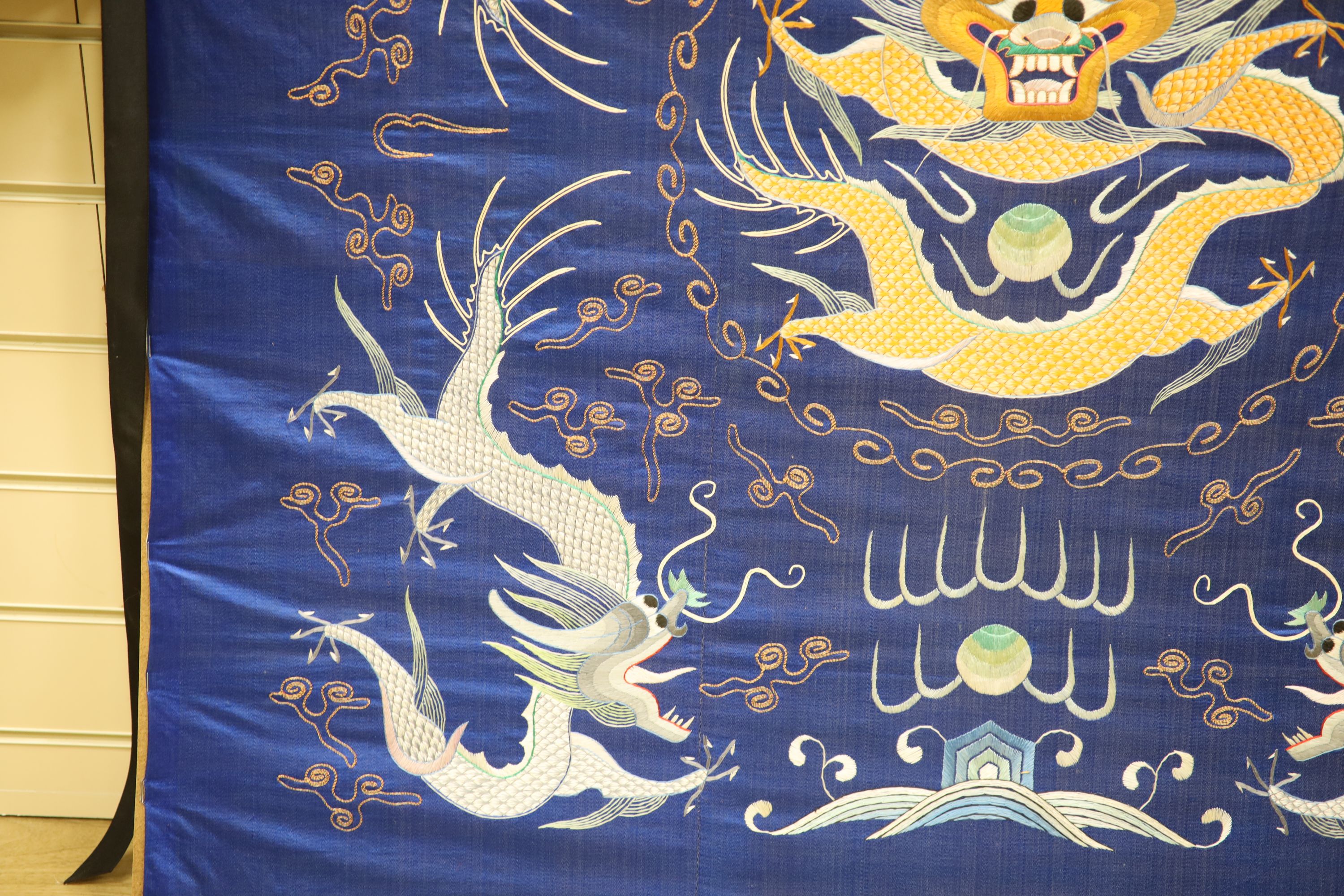 A square Chinese embroidered panel, 108cm